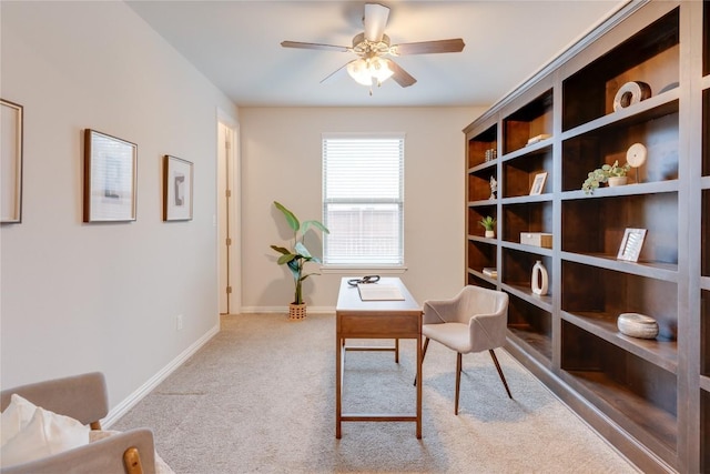 sitting room with light carpet and ceiling fan