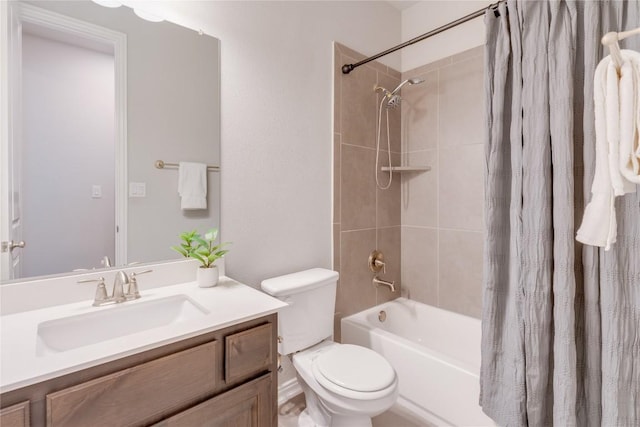 full bathroom with shower / tub combo with curtain, vanity, and toilet