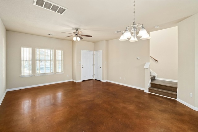 unfurnished living room featuring ceiling fan with notable chandelier