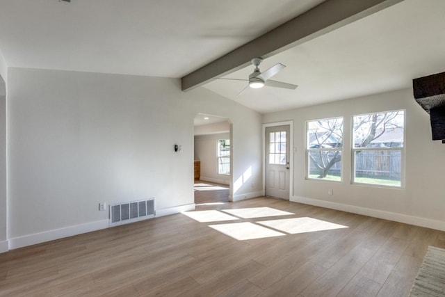 unfurnished living room featuring lofted ceiling with beams, light hardwood / wood-style flooring, and ceiling fan