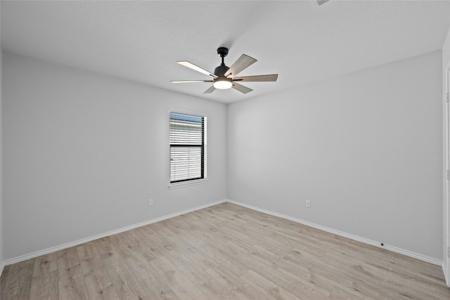 unfurnished room with light hardwood / wood-style floors