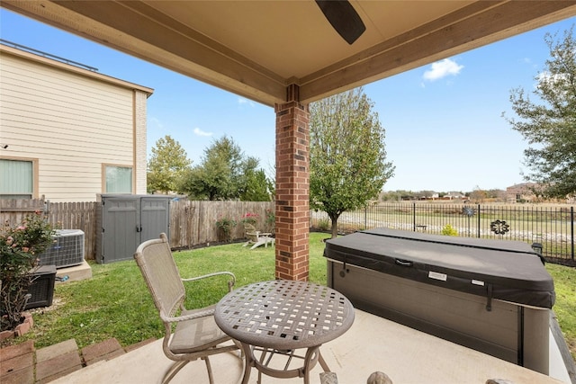 view of patio / terrace featuring a hot tub