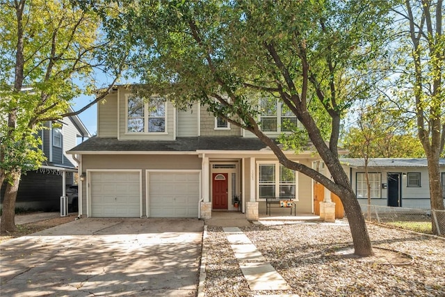 view of front of property with a garage