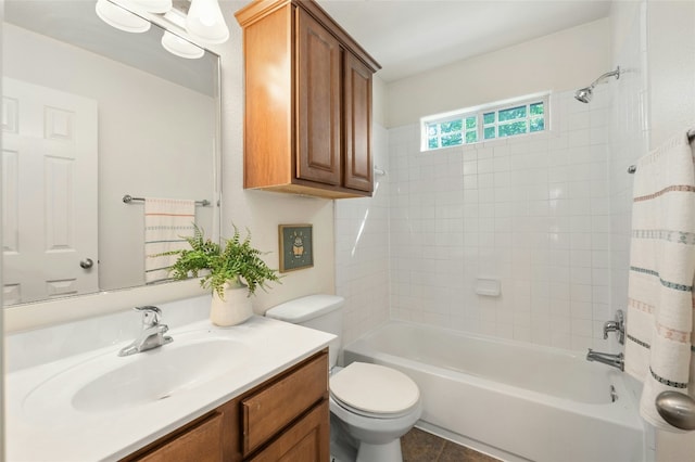 full bathroom with tile patterned floors, vanity, toilet, and tub / shower combination