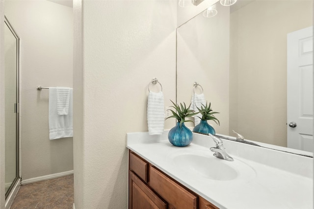 bathroom featuring vanity and walk in shower