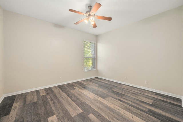 unfurnished room featuring ceiling fan and dark hardwood / wood-style flooring