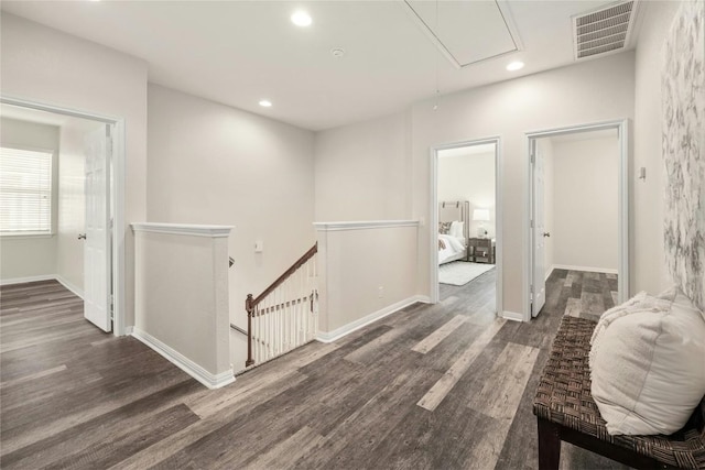 hallway featuring dark hardwood / wood-style floors