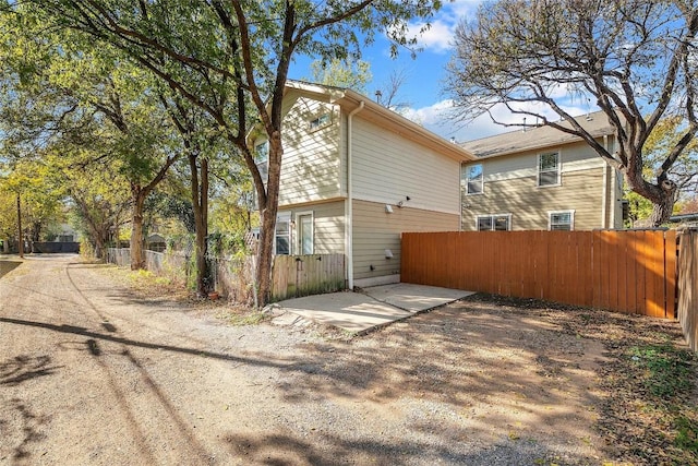 back of property featuring a patio area