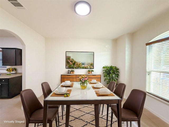 dining room featuring light tile patterned floors