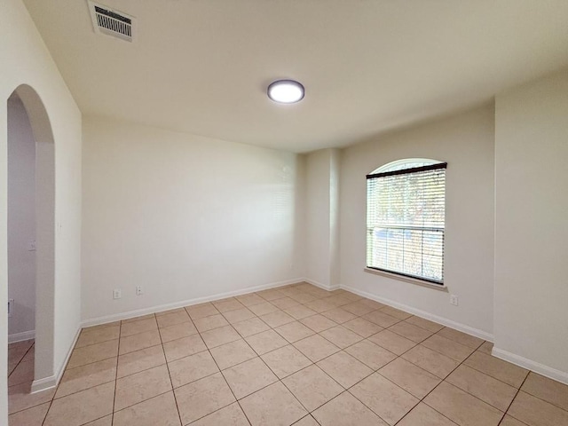 view of tiled spare room