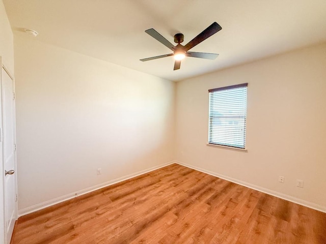 spare room featuring light hardwood / wood-style flooring