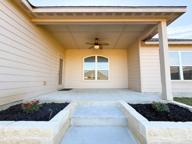 doorway to property with a patio