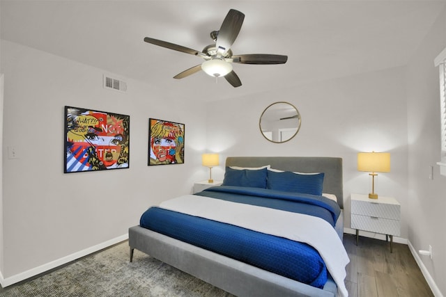 bedroom featuring ceiling fan and dark wood-type flooring