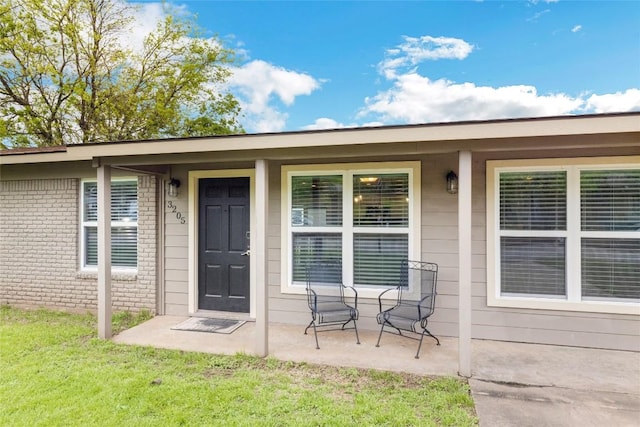 property entrance with a porch