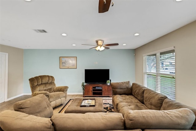 living room with ceiling fan