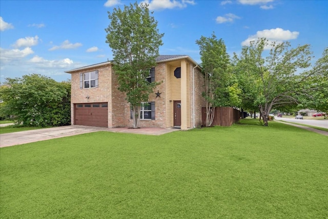 view of front of property featuring a front yard and a garage