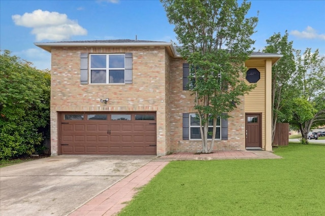 view of front of home featuring a front yard and a garage