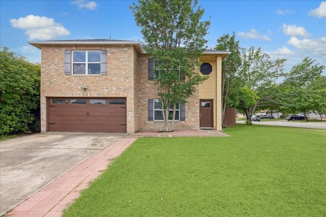 view of front of home featuring a front yard and a garage