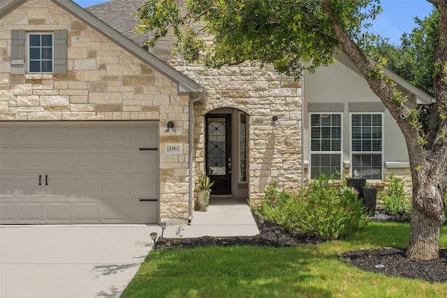 view of front of house with a garage