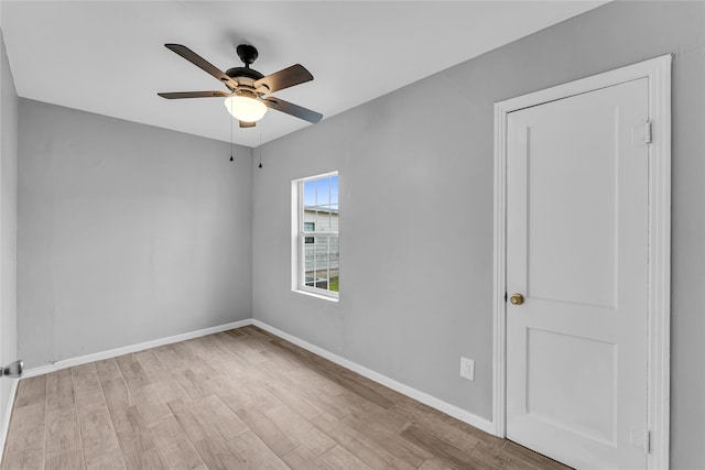 unfurnished room featuring ceiling fan and light hardwood / wood-style flooring