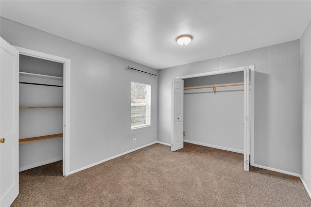 unfurnished bedroom with carpet floors