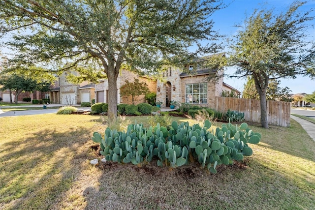 view of front of home with a front yard