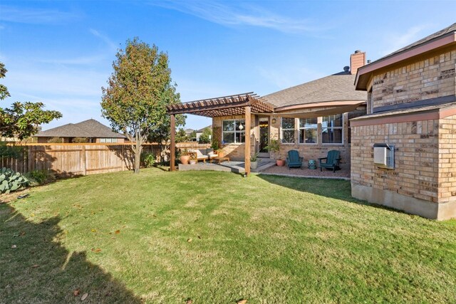 view of yard with a pergola and a patio area