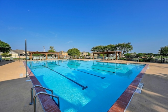 view of pool with a patio area and a pergola