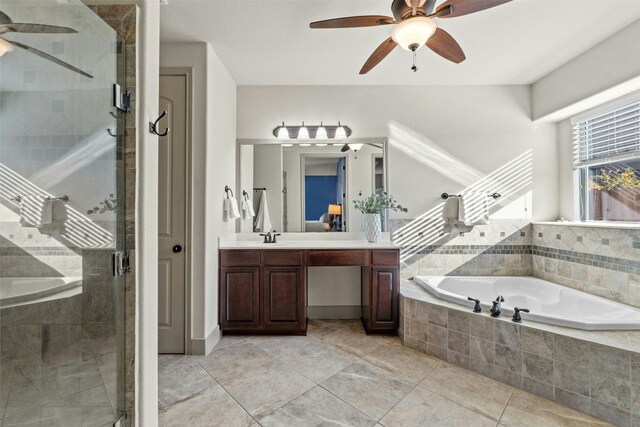 bathroom with vanity and plus walk in shower