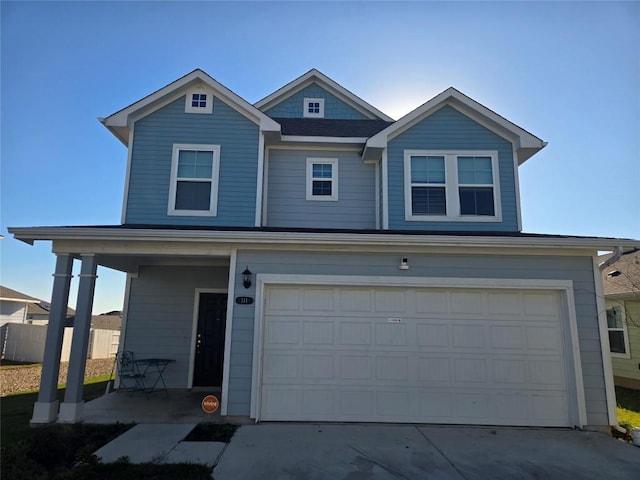 view of front of property with a garage