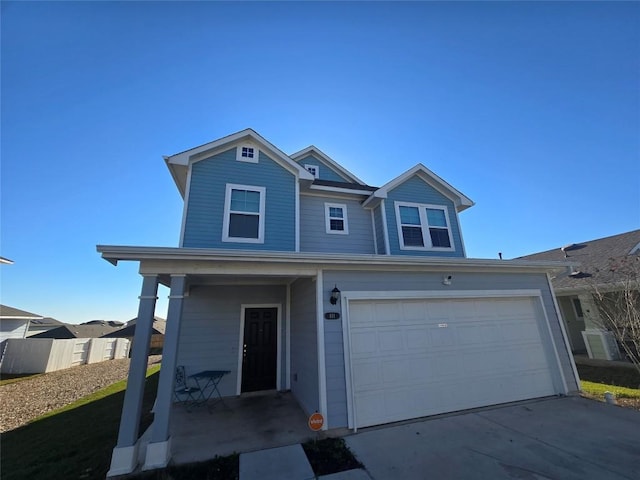 view of front facade featuring a garage and a porch