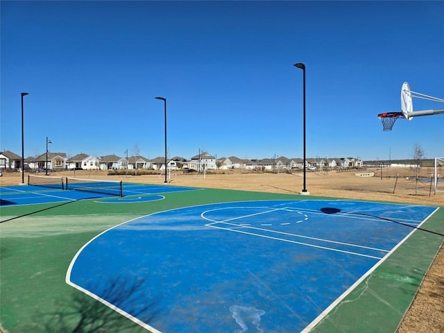 view of sport court with tennis court