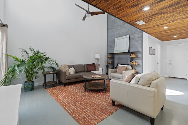 8518 Fathom Cir Unit 133, Austin, TX 78750 - living area featuring wooden ceiling, recessed lighting, finished concrete flooring, a ceiling fan, and baseboards