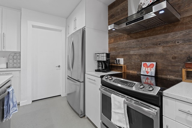 8518 Fathom Cir Unit 133, Austin, TX 78750 - kitchen featuring stainless steel appliances, extractor fan, white cabinets, and light stone countertops