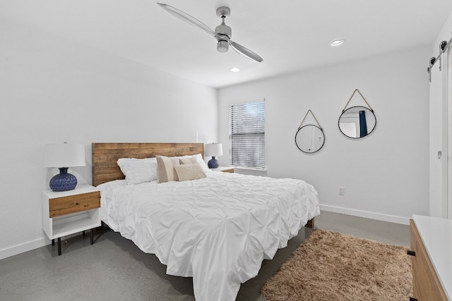 8518 Fathom Cir Unit 133, Austin, TX 78750 - bedroom with a barn door, baseboards, recessed lighting, and a ceiling fan