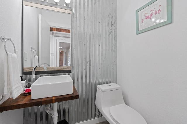 8518 Fathom Cir Unit 133, Austin, TX 78750 - bathroom featuring toilet and a sink