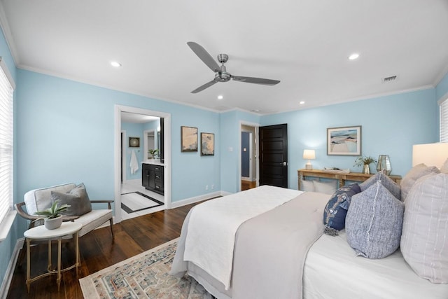 bedroom featuring hardwood / wood-style flooring, ensuite bath, ceiling fan, and crown molding