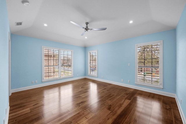 unfurnished room featuring ceiling fan, wood-type flooring, and vaulted ceiling