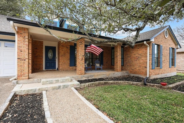 view of front of house with a porch and a garage