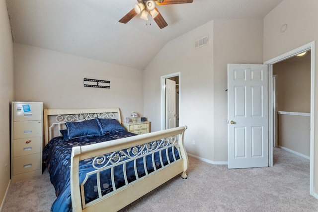 carpeted bedroom featuring ceiling fan and lofted ceiling