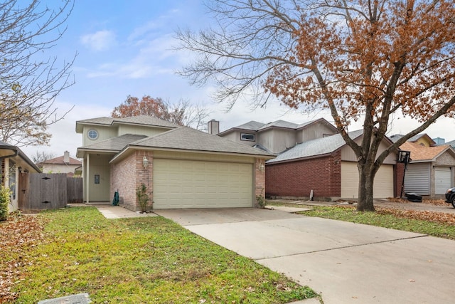 view of front of house with a garage and a front yard