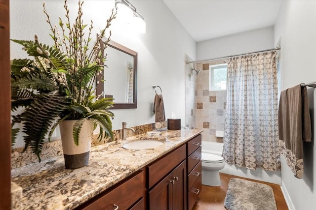 full bathroom featuring vanity, toilet, and shower / bath combo with shower curtain