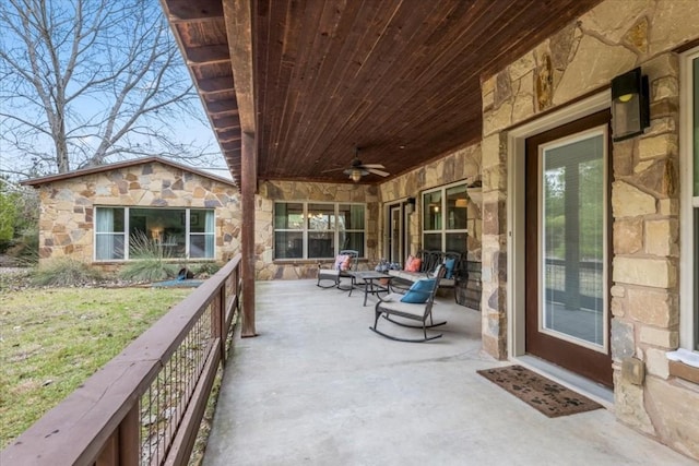 view of patio / terrace featuring ceiling fan