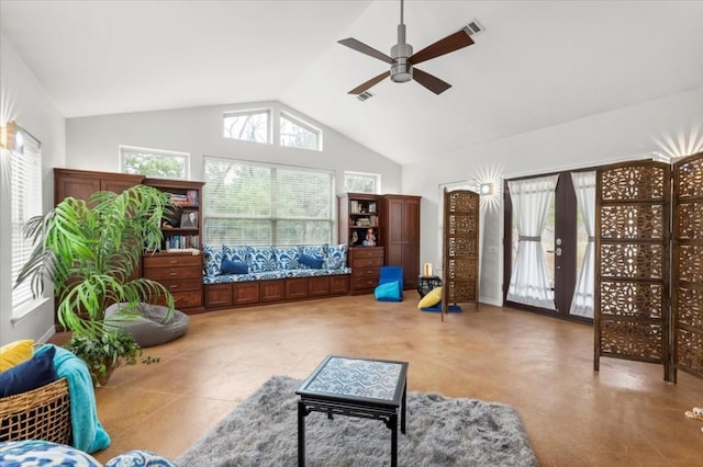 sunroom with ceiling fan, french doors, and vaulted ceiling