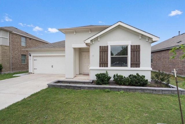 view of front of house with a front lawn and a garage