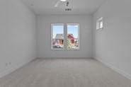 133 Gouda Dr, Bastrop, TX 78602 - unfurnished room featuring carpet flooring