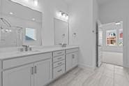 133 Gouda Dr, Bastrop, TX 78602 - bathroom featuring double vanity