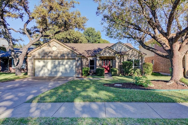 view of front of property with a garage and a front lawn