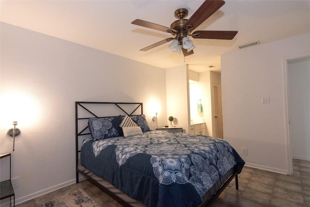 bedroom featuring ceiling fan and ensuite bath