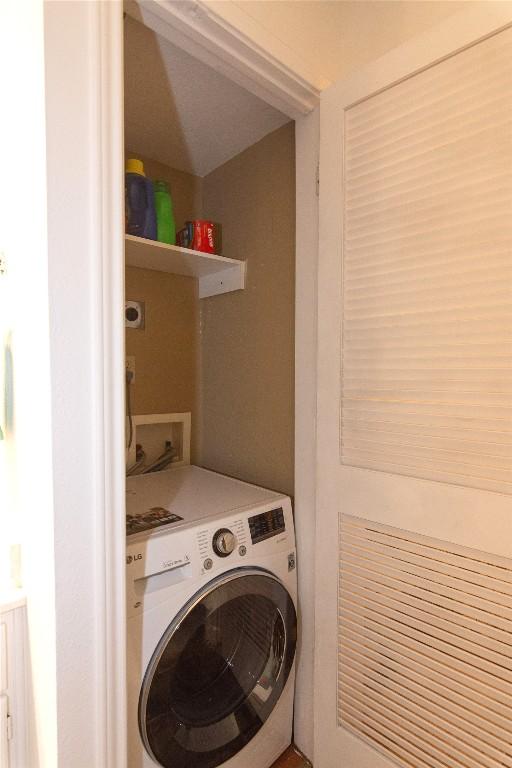 laundry area with washer / dryer